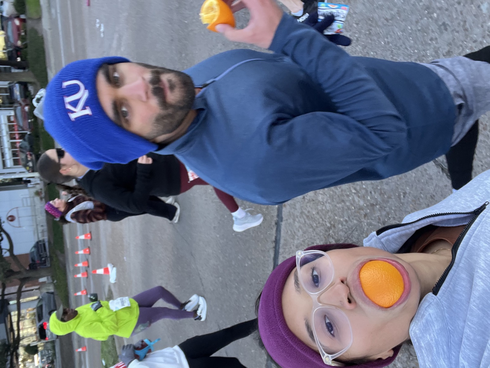 In the middle of running a half marathon in HTX with our friends and family.